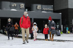 People Walk on Frozen Ground outside Kyoto Station