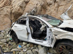 Father arrested for attempted murder and child endangerment after familys miracle escape when Tesla car went over cliff