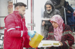 Turkish Red Crescent teams distribute hot meals to the earthquake victims