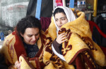 2 sisters rescued from the rubble, awaiting the rescue of other family members in Malatya