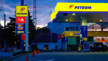Bucharest, Romania - June 22, 2022: A Petrom gas station is seen at night in Bucharest Editorial stock photo - stock image
