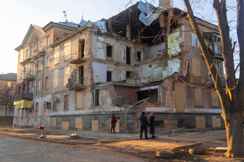 City of Krivoy Rog, Dnepropetrovsk region, Ukraine - 19-12-2022: Street with a house destroyed by rocket fire. War in Ukraine