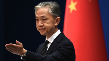 Chinese Foreign Ministry spokesman Wang Wenbin gestures during a press conference
