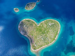 Aerial view of the heart shaped Galesnjak island on the adriatic coast.