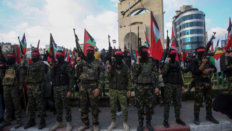 Palestinian Fighters Take Part in a Parade Against Aqaba Summit