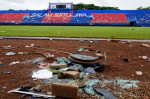 The condition; outside and inside; the Kanjuruhan Stadium; the riot that killed; victims; Malang; East Java; Tragedy; football supporters'; shoes; clocks and others; facilities damaged; Indonesian football; imourning; Arema vs. Persebaya match; 129 people