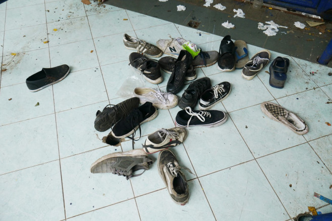 The condition; outside and inside; the Kanjuruhan Stadium; the riot that killed; victims; Malang; East Java; Tragedy; football supporters'; shoes; clocks and others; facilities damaged; Indonesian football; imourning; Arema vs. Persebaya match; 129 people