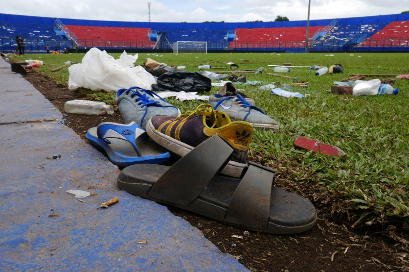 The condition; outside and inside; the Kanjuruhan Stadium; the riot that killed; victims; Malang; East Java; Tragedy; football supporters'; shoes; clocks and others; facilities damaged; Indonesian football; imourning; Arema vs. Persebaya match; 129 people