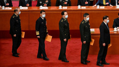 Military delegates (C) prepare to vote during the fifth plenary session of the National People's Congress (NPC) at the Great Hall of the People in Beijing