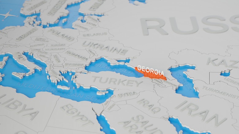 Georgia highlighted on a white simplified 3D world map. Digital 3D render.