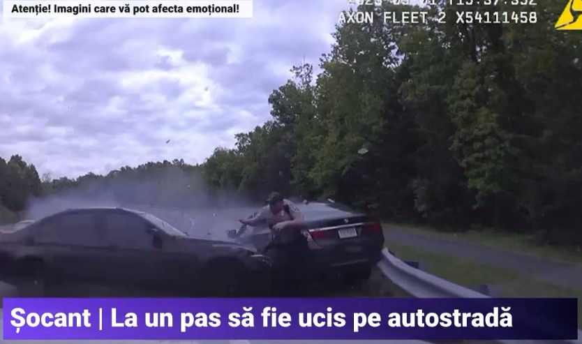 VIDEO Un polițist scapă ca prin urechile acului înainte să fie strivit între două mașini