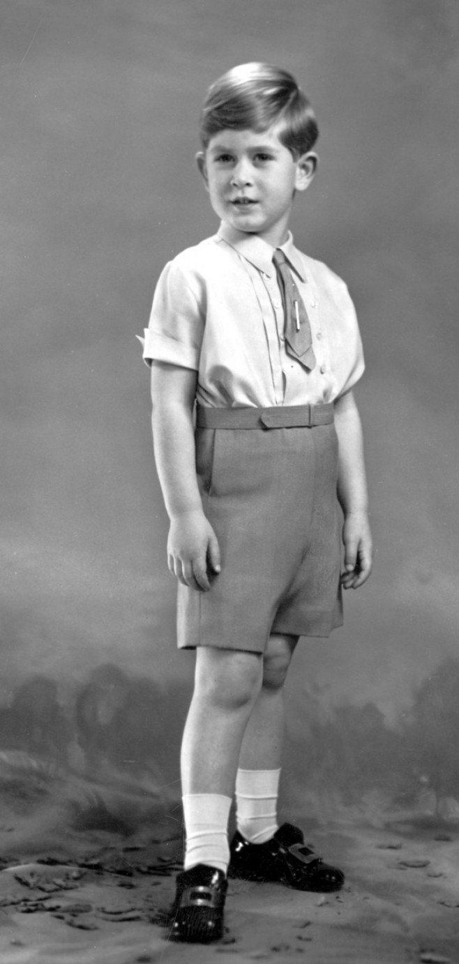 Prince Charles 5th birthday 1953 wearing cream shantung shirt and pale blue shorts with tie to match and gold tie pin 1953