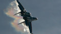 Un avion Suhoi Su-35 efectuează manevre deasupra unei baze militare din Rusia, de lângă Moscova, pe 25 august 2020.