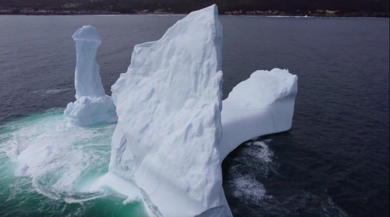 EXCLUSIVE: VIDEO: Huge WILLY-shaped ICEBERG floats past town called DILDO