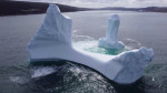 EXCLUSIVE: VIDEO: Huge WILLY-shaped ICEBERG floats past town called DILDO