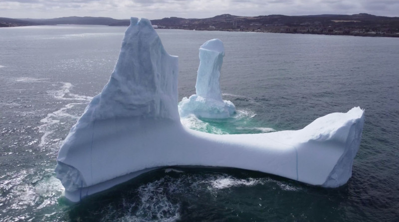 EXCLUSIVE: VIDEO: Huge WILLY-shaped ICEBERG floats past town called DILDO