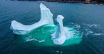 EXCLUSIVE: VIDEO: Huge WILLY-shaped ICEBERG floats past town called DILDO