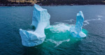 EXCLUSIVE: VIDEO: Huge WILLY-shaped ICEBERG floats past town called DILDO