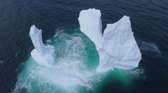 EXCLUSIVE: VIDEO: Huge WILLY-shaped ICEBERG floats past town called DILDO