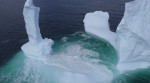 EXCLUSIVE: VIDEO: Huge WILLY-shaped ICEBERG floats past town called DILDO