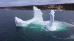 EXCLUSIVE: VIDEO: Huge WILLY-shaped ICEBERG floats past town called DILDO