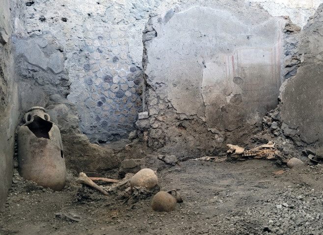 Italy, the ancient Roman city of Pompeii: Archeologists have discovered two more skeletons in the ruins of Pompeii, the ancient Roman city wiped out by an eruption of volcano Mount Vesuvius nearly 2000 years ago..The skeletons were recovered from a buildi