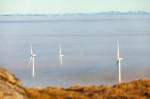 Wind turbines sticking out of clouds caused by a temperature inversion in the Ochil Hills Scotland