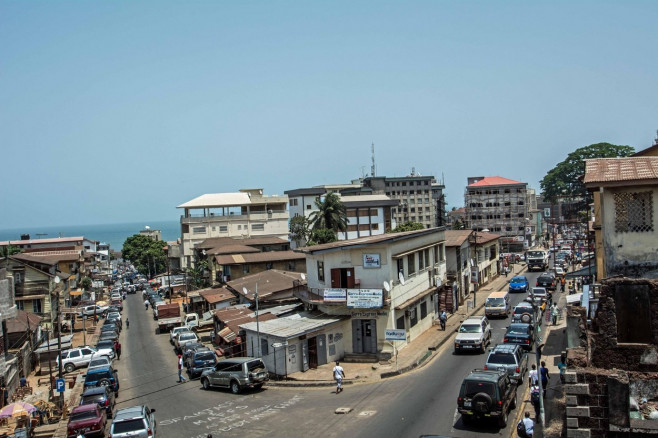 Freetown city skyline of Siaka Steven Street and the cotton tree, Sierra Leone