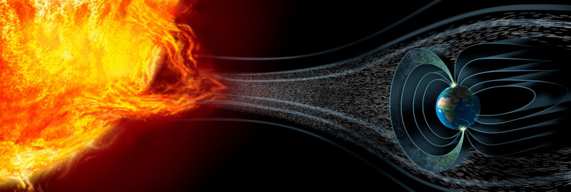 ilustrație cu o erupție solară și cum interacționează cu câmpul magnetic al Pământului