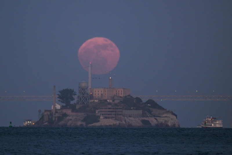 Full Strawberry Moon rises over Alcatraz of San Francisco