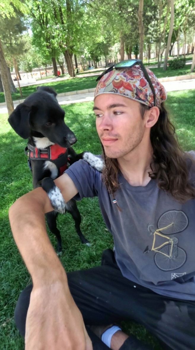 MAN AND DOG TRAVEL 7,000 MILES ACROSS THE WORLD ON A TALL BIKE