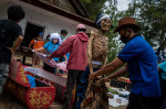 Family Members Perform Ma'nene Ritual To Honor The Spirits Of Their Mummified Ancestors