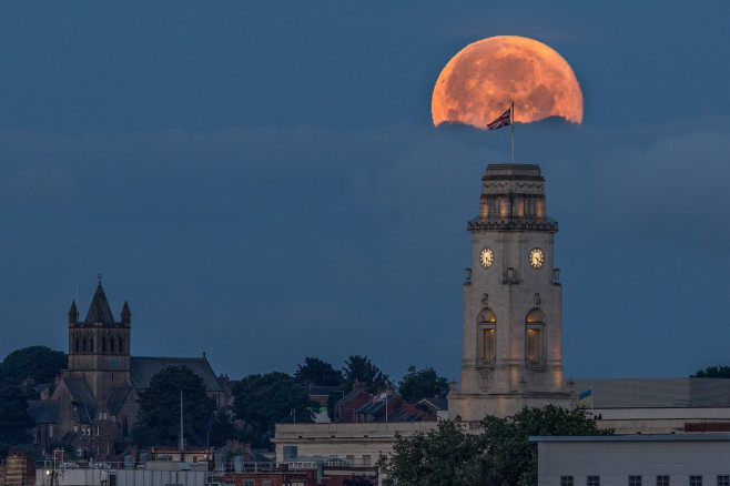 The Buck Moon sets over Barnsley Town Hall