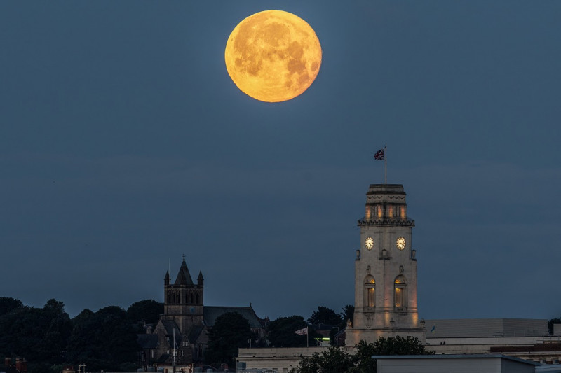 The Buck Moon sets over Barnsley Town Hall