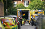 Car collides with primary school building