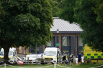 Car collides with primary school building