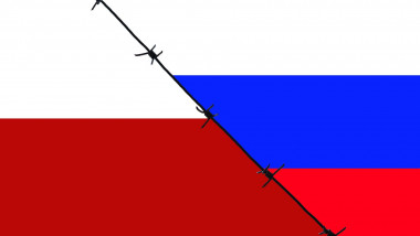 Barbed wire separating the flags of Poland and Russia