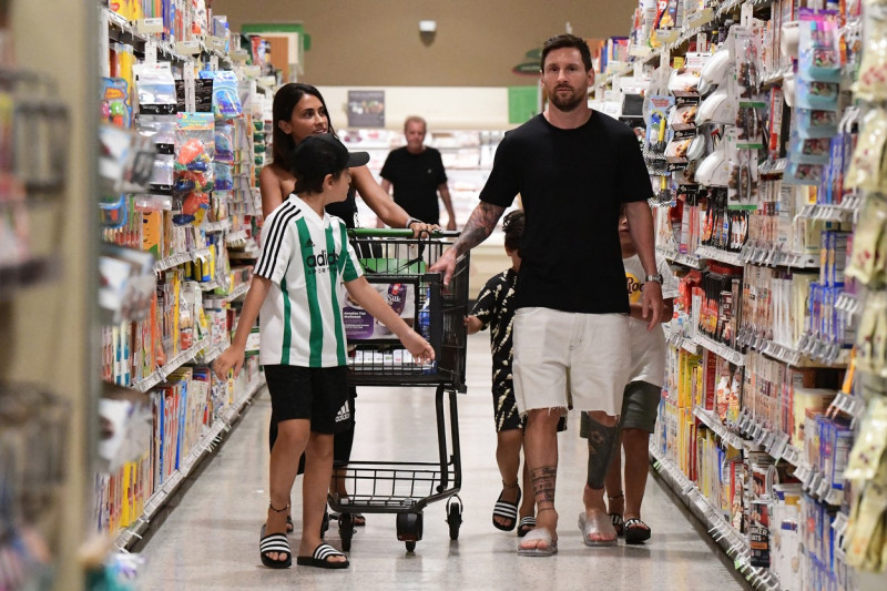 EXCLUSIVE: Lionel Messi and his wife Antonella start adjusting to life in America as they take their three sons to a Miami supermarket