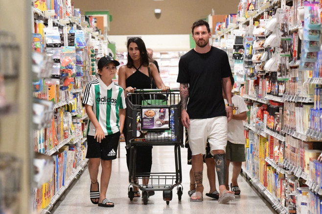 EXCLUSIVE: Lionel Messi and his wife Antonella start adjusting to life in America as they take their three sons to a Miami supermarket