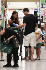 EXCLUSIVE: Lionel Messi and his wife Antonella start adjusting to life in America as they take their three sons to a Miami supermarket