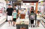 EXCLUSIVE: Lionel Messi and his wife Antonella start adjusting to life in America as they take their three sons to a Miami supermarket