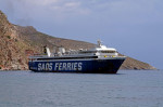 Greek roll on roll off (ro-ro) ferry the Stavros, turning into Tilos harbour. Tilos, Greece cym