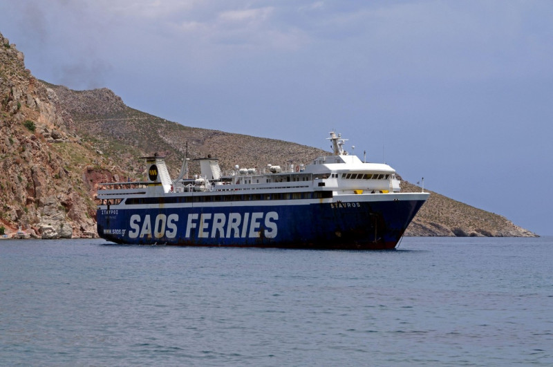Greek roll on roll off (ro-ro) ferry the Stavros, turning into Tilos harbour. Tilos, Greece cym