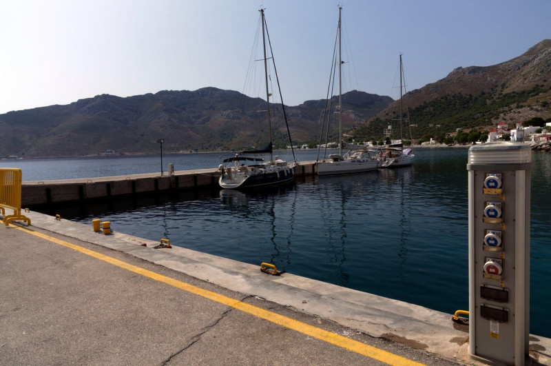 Livadia harbourside with boat services. Tilos island, Dodecanese, Greece, EU