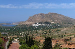 Megalo Chorio village on the side of hill, as seen from across the valley.at the elephant cave, Tilos.