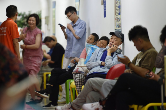 China Heatwave: Air-Raid Shelter Used To Cool Off