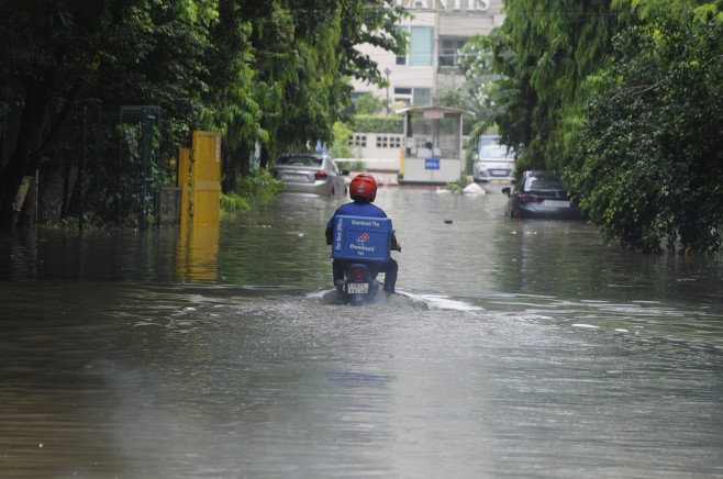 GURUGRAM, INDIA - JULY 9: A view of a waterlogged stretch during monsoon rain at sector-31, on July 9, 2023 in Gurugram,