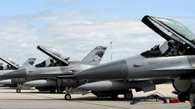 F-16 Fighting Falcons await to launch for a training mission.