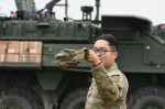 U.S. Army Spc. Samuel Hoang, assigned to Palehorse Troop, 4th Squadron, 2nd Cavalry Regiment, prepares to catch a PD-100 Black Hornet Nano Drone during a situational training exercise at the 7th Army Training Command's Grafenwoehr Training Area, Germany,