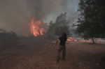 Wildfires Continue To Rage Across Greek Island Of Rhodes